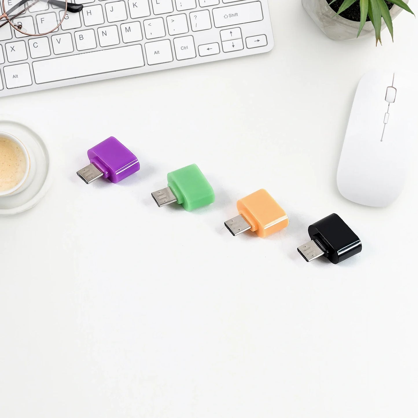 Micro USB OTG adapter connectors in purple, green, orange, and black