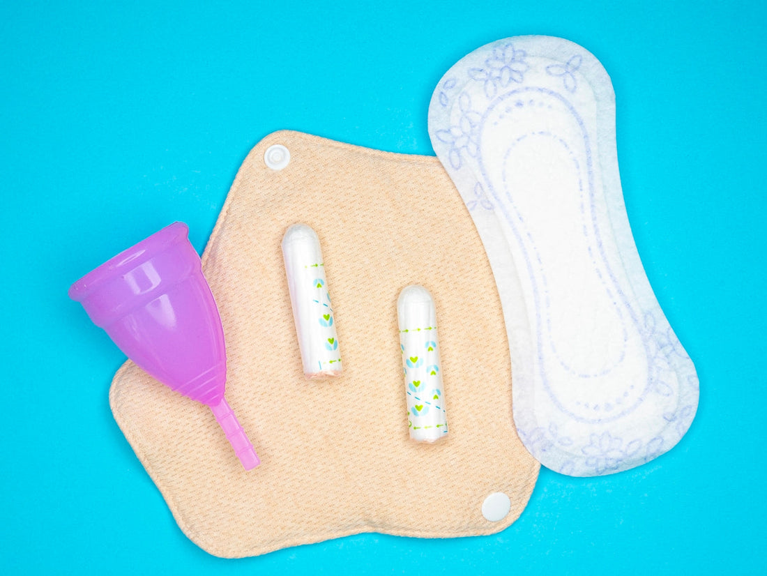 a pair of baby's shoes and a pair of baby's toothbrush
