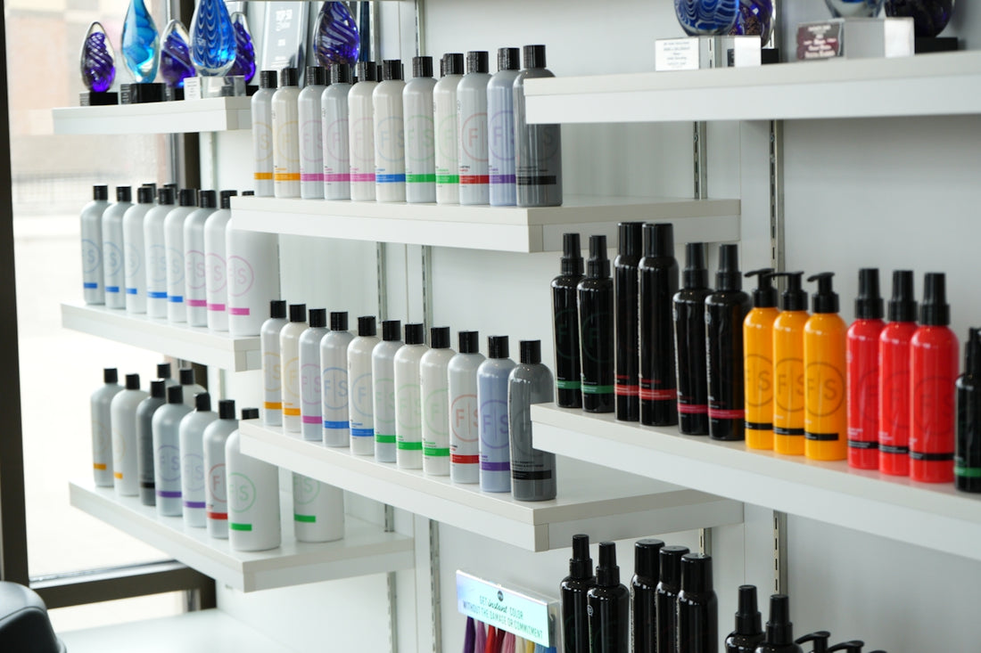 Shelves stocked with rows of hair care products.