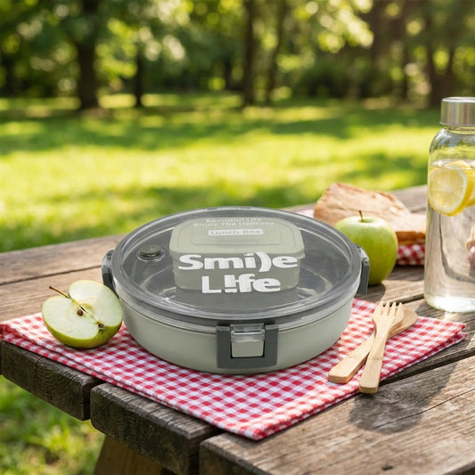 Round stainless steel lunch box with clear lid and clasp