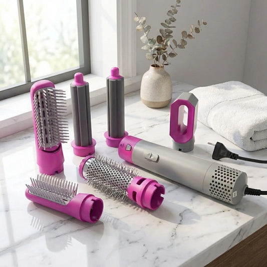 5-in-1 hot air hair styler with pink and gray attachments and barrel brush