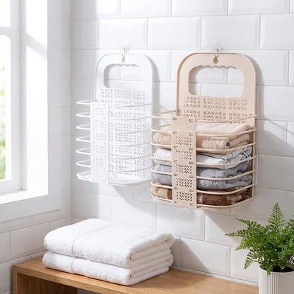 Wall-mounted collapsible laundry baskets in white and beige with front handles