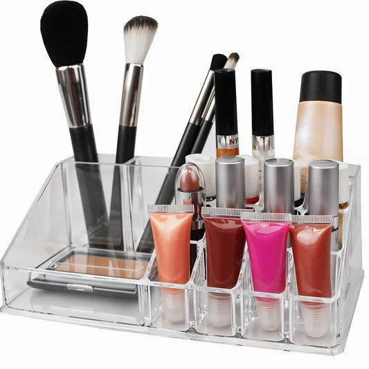 16-compartment cosmetic organiser in clear acrylic with divided sections and brush holders