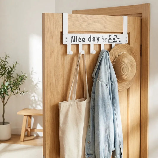 Carbon steel door hook with four pegs, mounted on a wooden door
