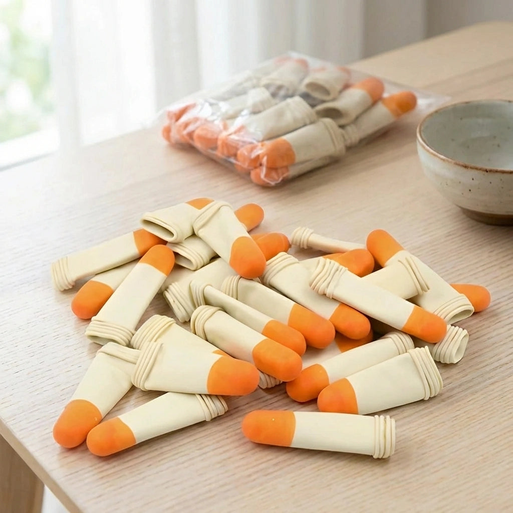 Silicone finger pain protectors with orange cushioned tips, packaged in a bundle