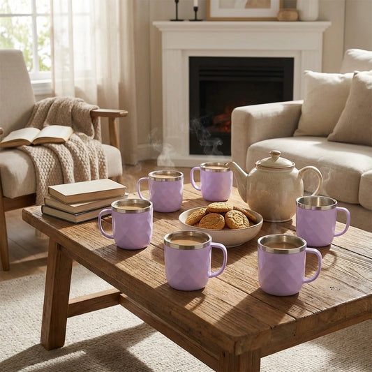 Lavender ceramic tea cup set with gold rims, matching teapot and cups