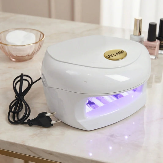 White UV LED nail lamp with glowing purple curing light window and power cord