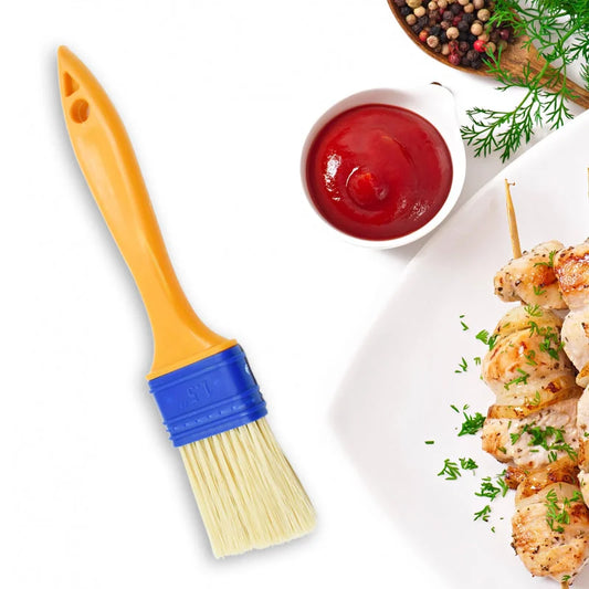 2-in-1 pastry brush with yellow handle, blue ferrule, and light bristles
