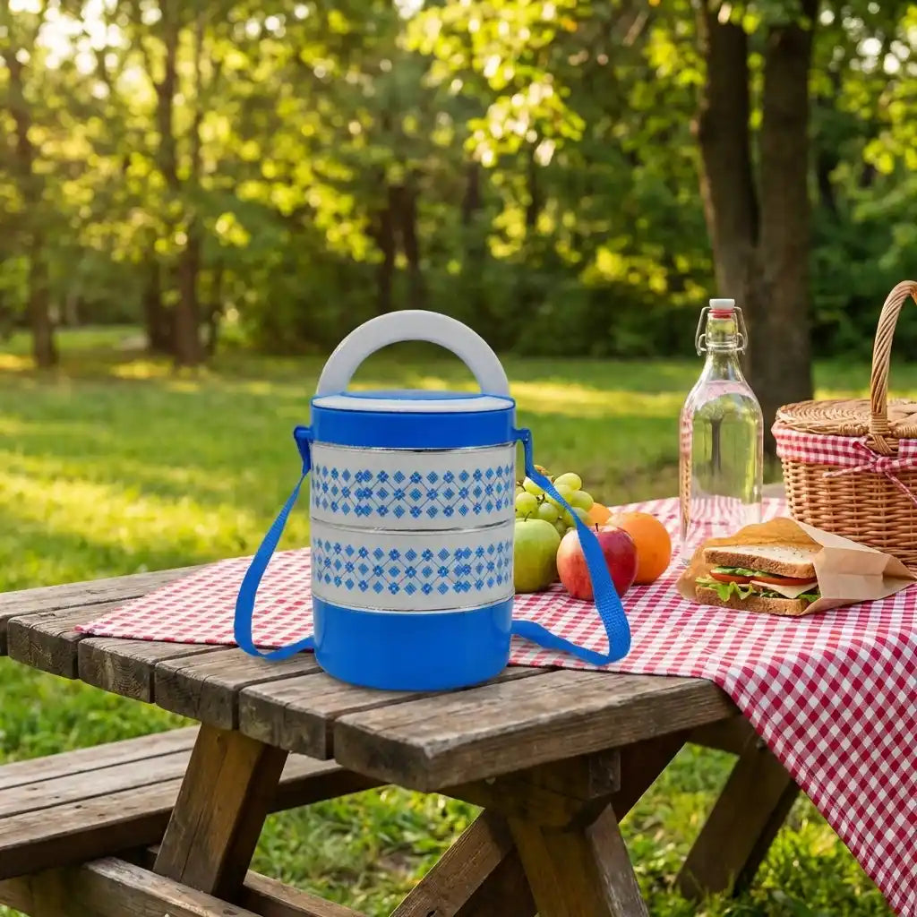 Blue patterned insulated tiffin lunch container with carry strap and top handle