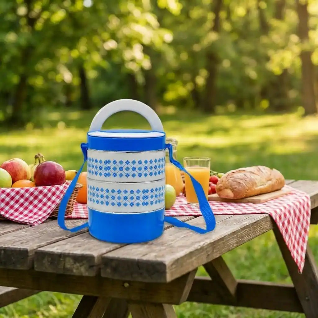 Blue patterned 3-tier tiffin container with carry strap and white top lid