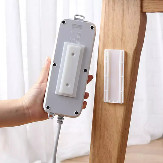 Self-adhesive wall hook with gray backing and clear adhesive strip