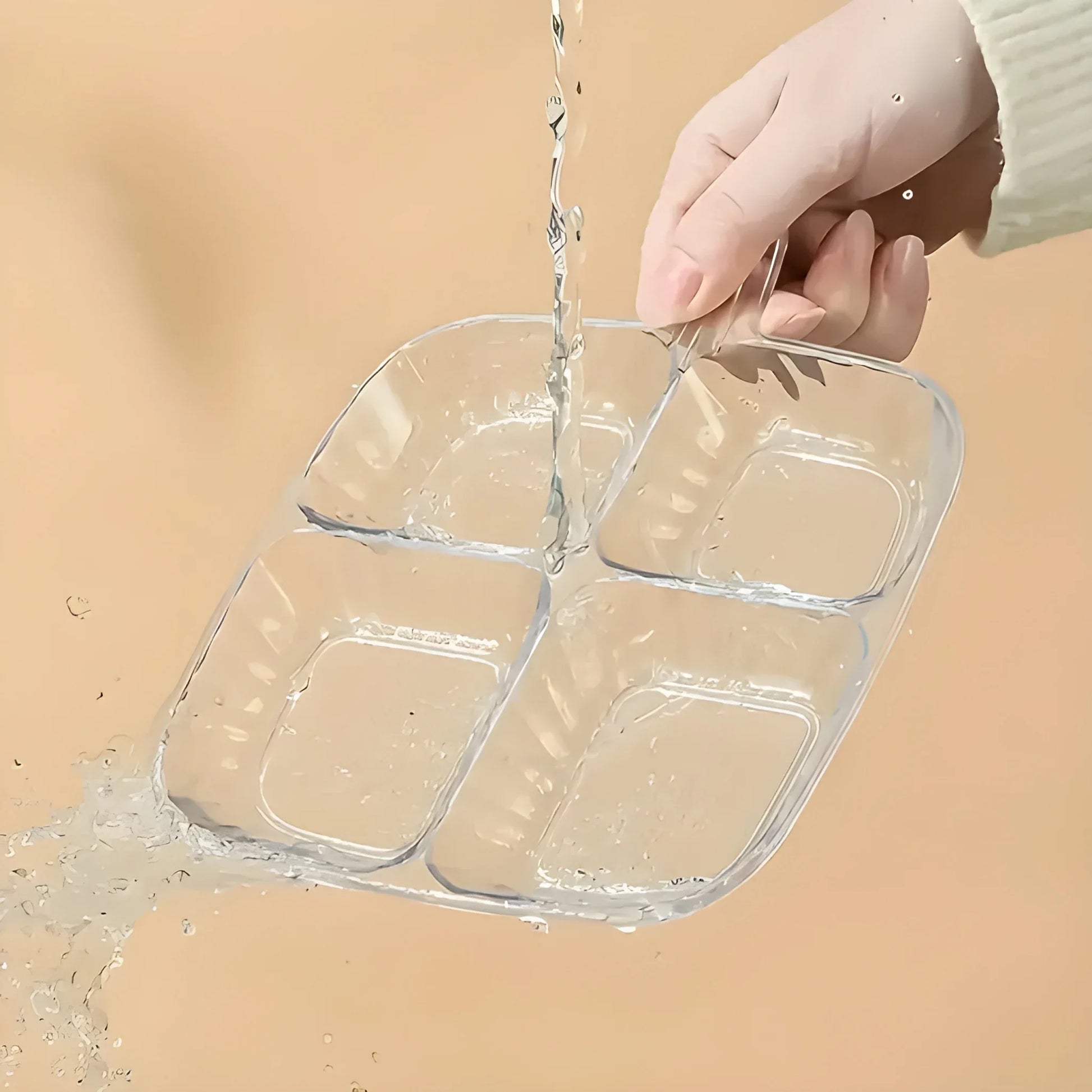 Clear 4-section serving tray with rounded square compartments