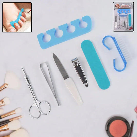 Manicure set with metal clippers, scissors, nail file, and blue toe separators