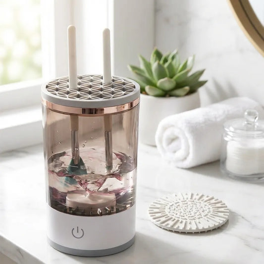 Automatic makeup brush cleaner with clear chamber and rotating brush slot head