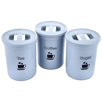 Set of tea, sugar, and coffee storage containers in light blue with sealed lids.