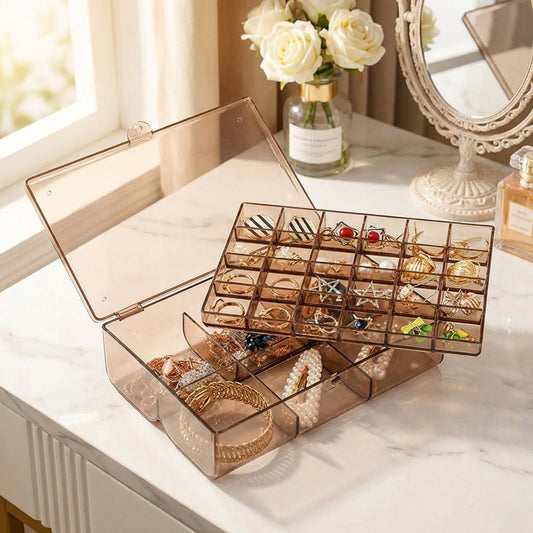 Acrylic jewelry storage box with clear lid and grid compartments for rings and earrings