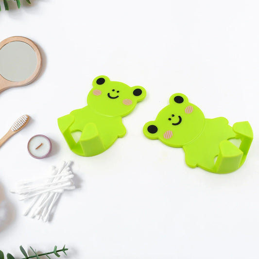 Frog-shaped adhesive hook holders, green, set of 2