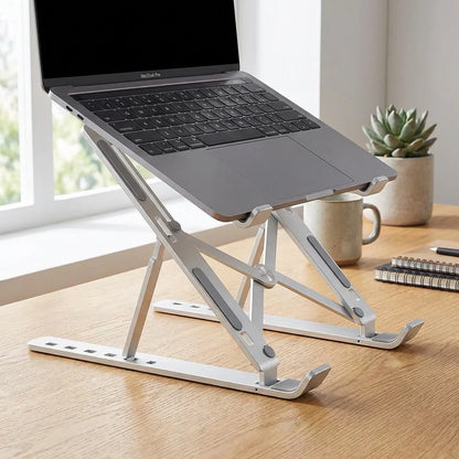 Adjustable laptop desk stand with gray metal legs and non-slip top supports