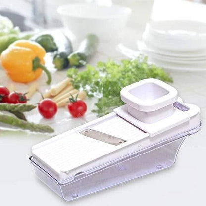Adjustable vegetable and fruit slicer with white handle and silver base