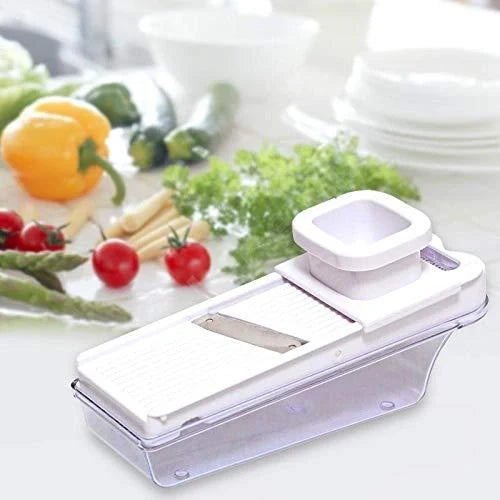Adjustable vegetable and fruit slicer with white handle and silver base