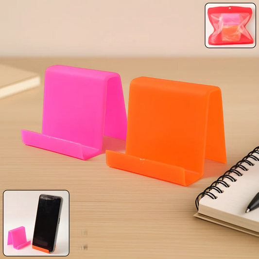 Angled plastic phone stand in pink and orange, with phone support tray