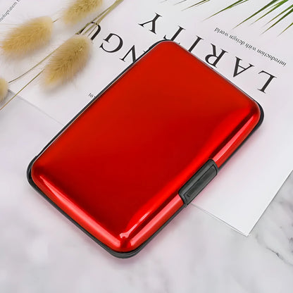 ArmorCard Pro case with glossy red front and black protective border, card-slot button