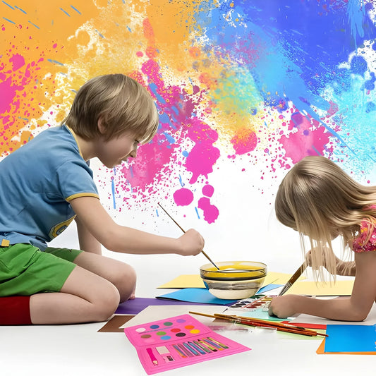 Art color kit with paint palette, brushes and colored pencils on paper