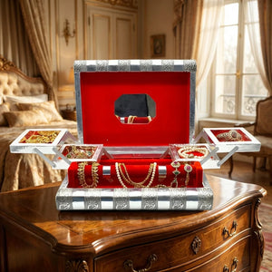 Jewelry bangle organizer with red-lined display tray and hinged silver base