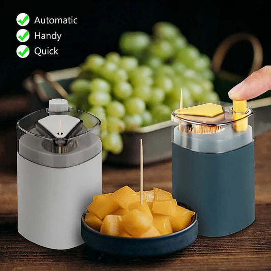 Automatic toothpick dispenser with gray and blue canisters, dispensing toothpicks