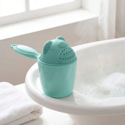 Teal baby bath rinse cup with perforated spout and handle