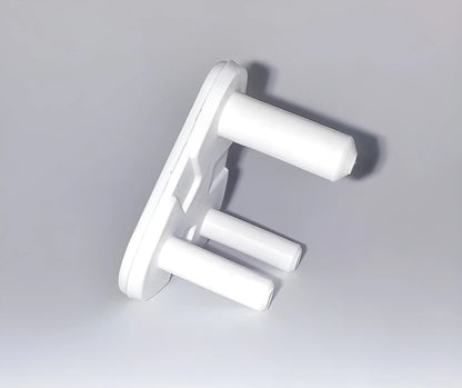 White baby socket safety covers with two prongs
