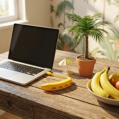 Banana-shaped USB 2.0 hub with multiple ports lying on a wooden table