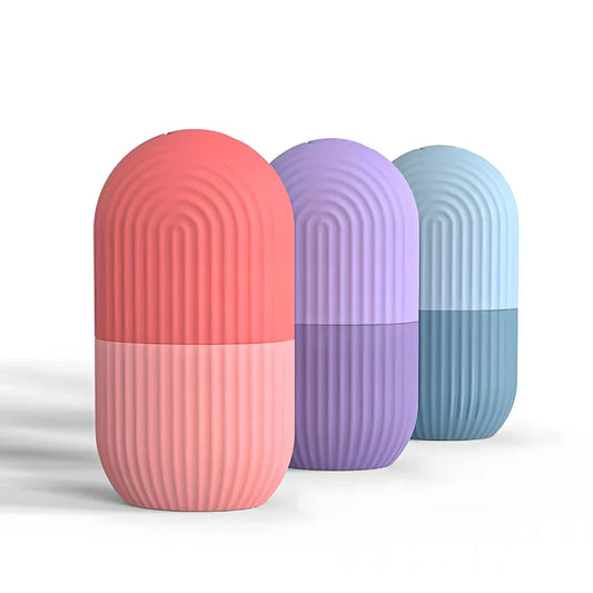 Face massage roller set, ribbed cylinders in pink, purple, and blue