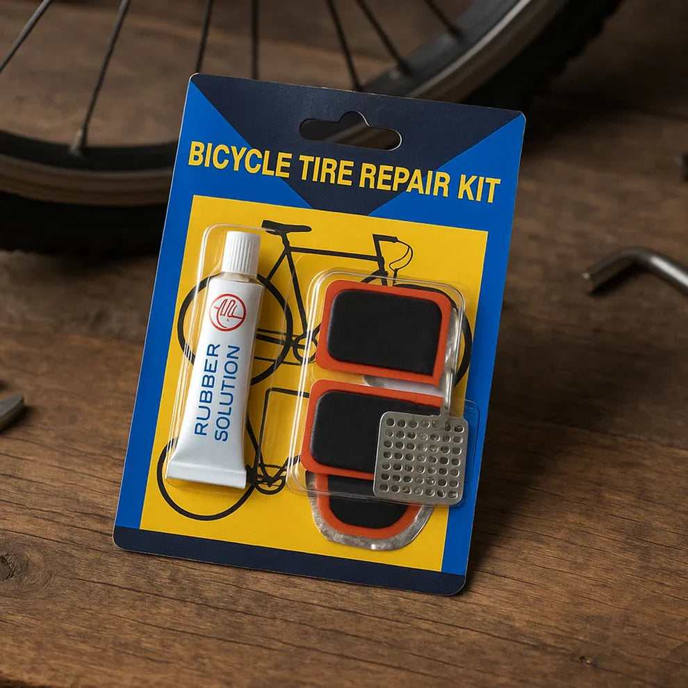 Bicycle tire repair kit in blue blister pack with rubber solution bottle and patch tool