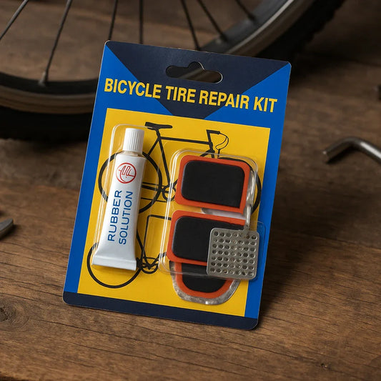 Bicycle tire repair kit in blue blister pack with rubber solution bottle and patch tool