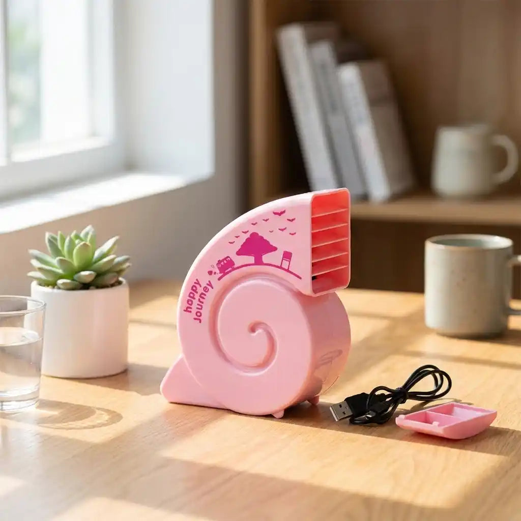 Pink USB mini fan with red side grille and attached USB cable
