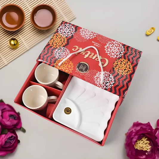 Ceramic tea cup set with red patterned gift box, two cups and matching saucers