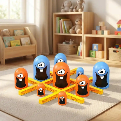 Tic-tac-toe strategy game set with yellow grid and blue and orange character pieces
