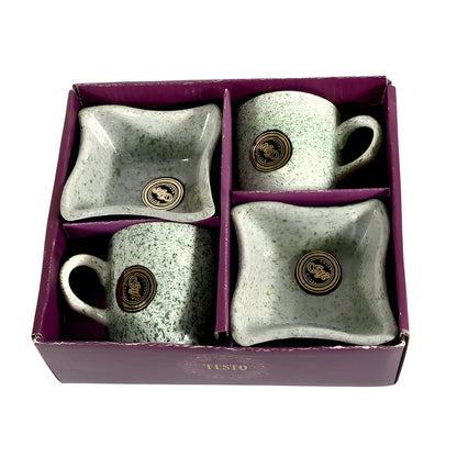 Ceramic cup and bowl set with speckled light gray glaze, gold logo