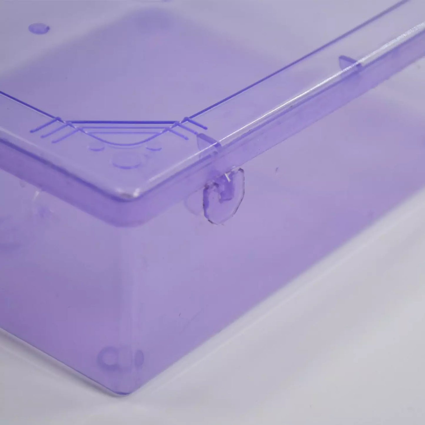 Purple storage container corner with clear latch and snap lid