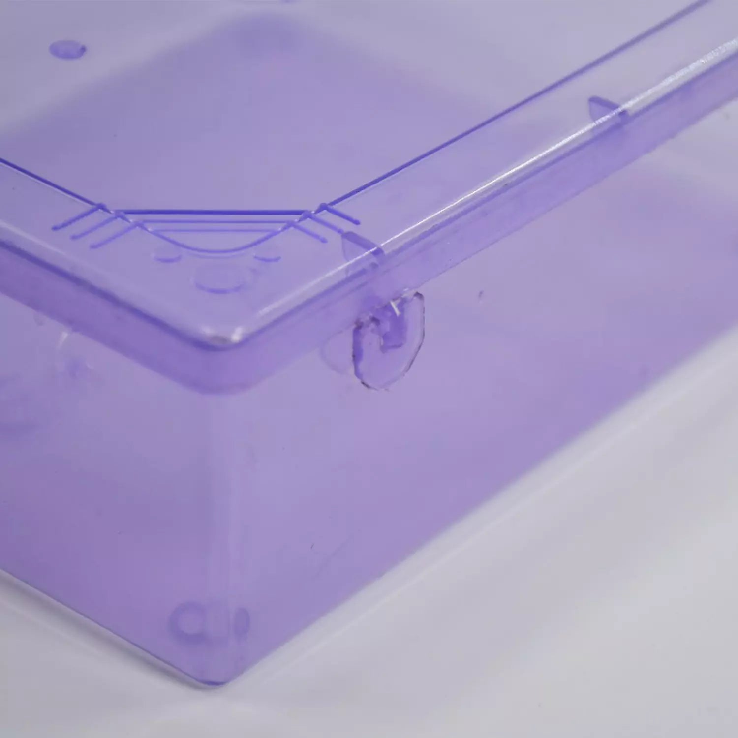 Purple storage container corner with clear latch and snap lid