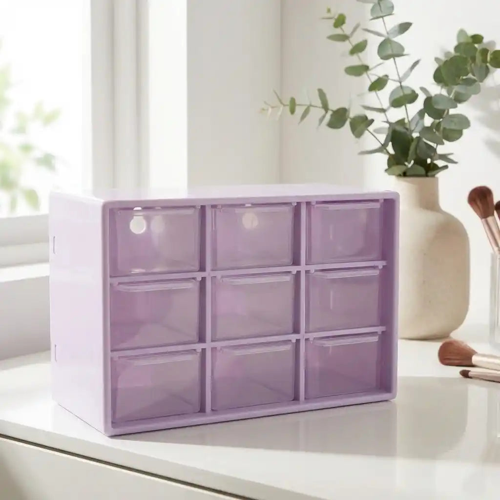 Compact jewelry drawer organizer with 3x3 translucent storage compartments, purple tinted