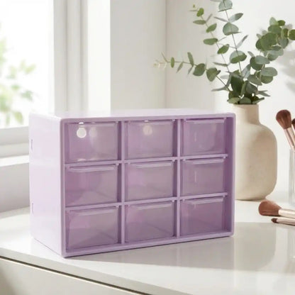 Compact jewelry drawer organizer with 3x3 translucent storage compartments, purple tinted