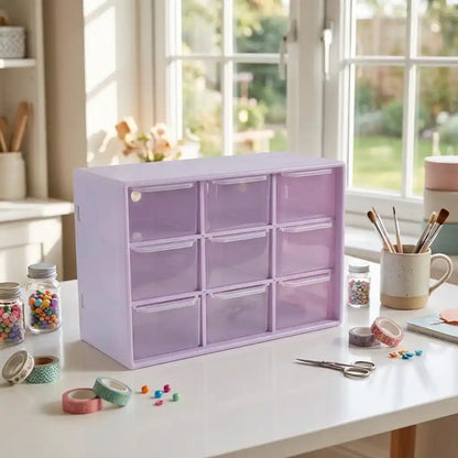Compact jewelry drawer organizer with multiple clear drawers, purple tinted, closed