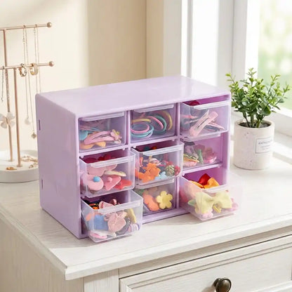 Compact jewelry drawer organizer with lid open, clear bins and drawers filled with craft pieces