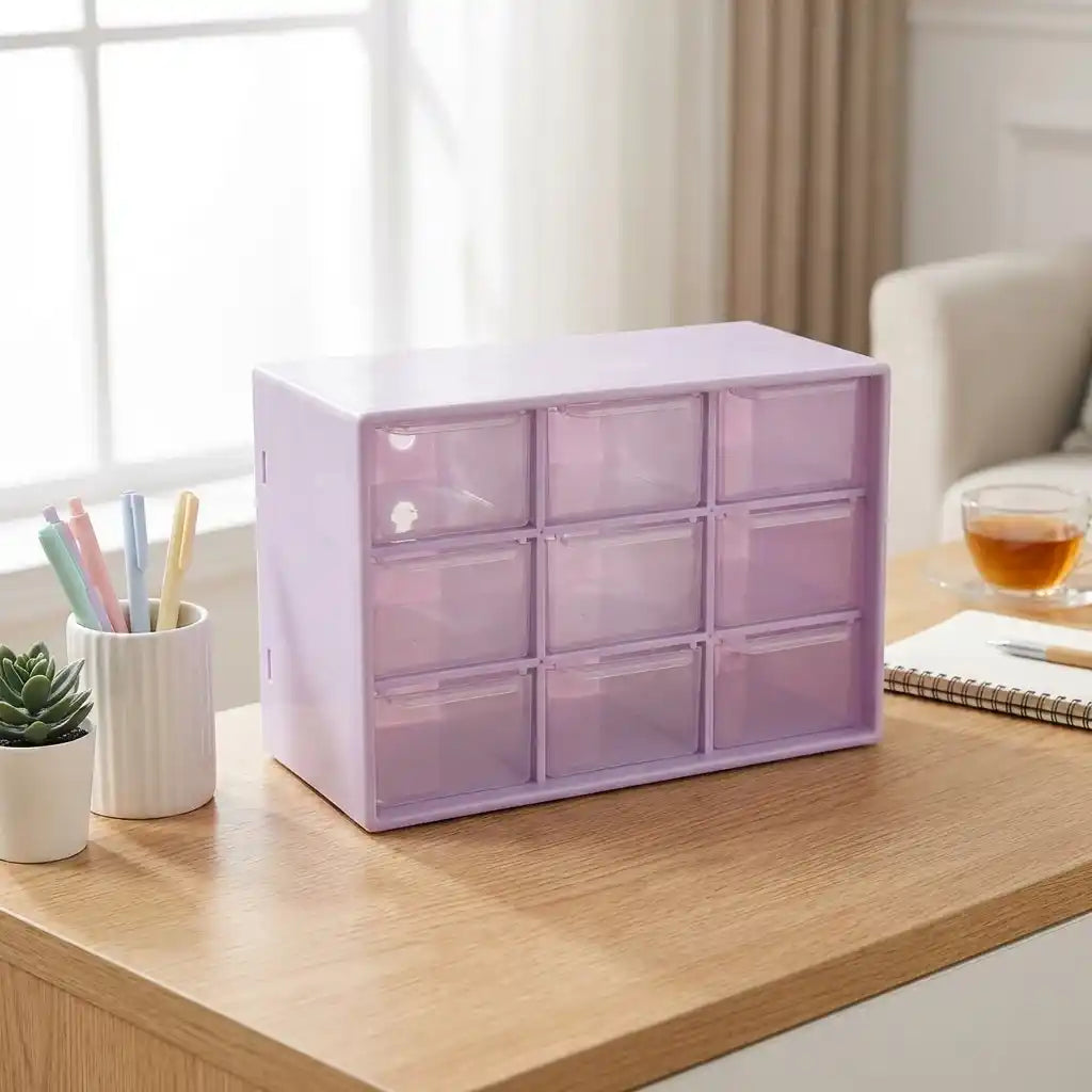 Compact jewelry drawer organizer with 3x3 clear drawers, purple tinted, on tabletop