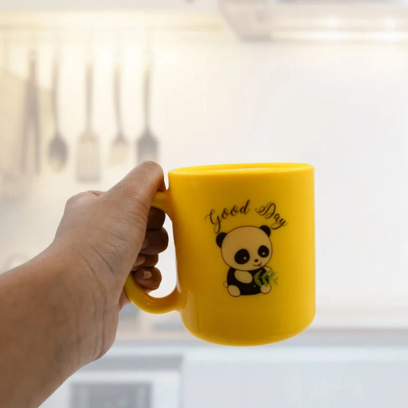 Yellow coffee mug with panda graphic and Good day print