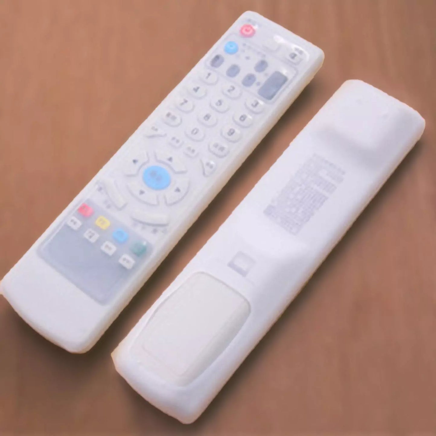 TV remote cover, white silicone with clear button window and cutouts