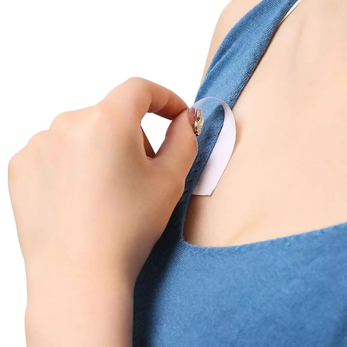 Double-sided fashion tape applying strip on blue fabric neckline