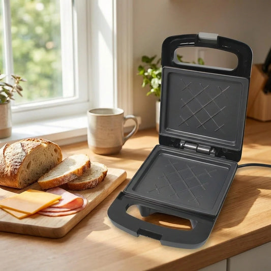 Easy-Clean sandwich maker, black, open with nonstick plates and upright handle